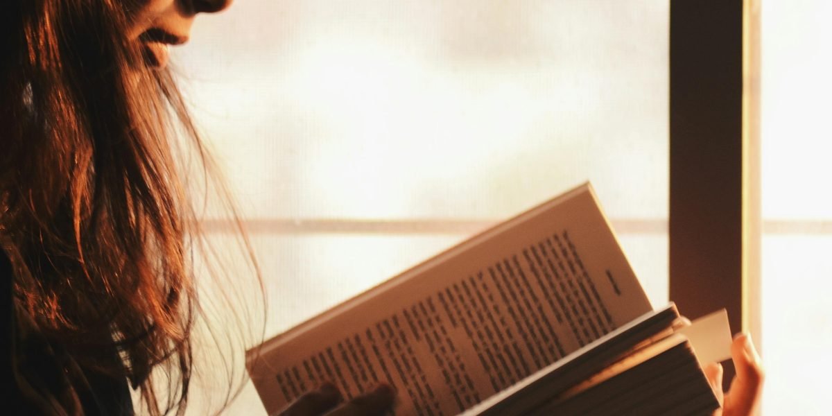 Finding peace and laughter by stepping away from technology and enjoying a good book.