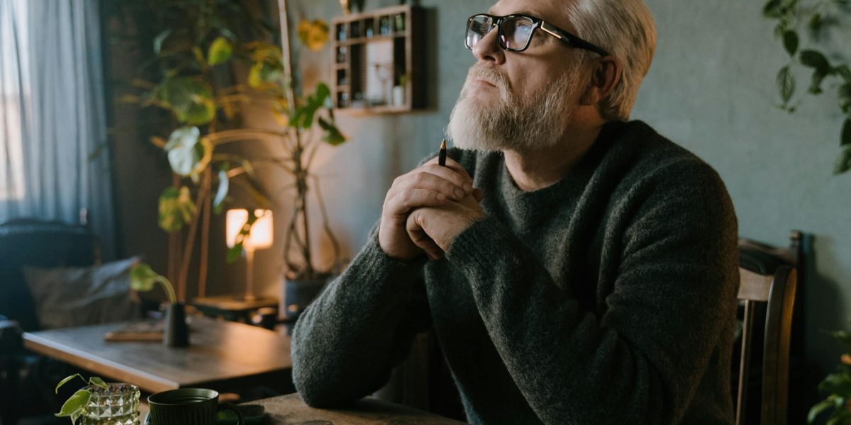 A person contemplates an unconventional yet effective solution to a common household problem, much like the tin foil trick for WiFi.