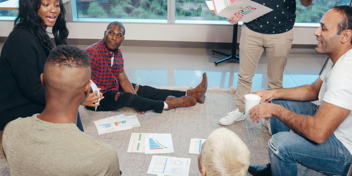 A team engaged in a serious discussion, representing the important ethical considerations in content creation.