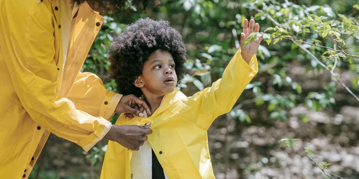 A family engages in real-world exploration, applying concepts learned from educational content.