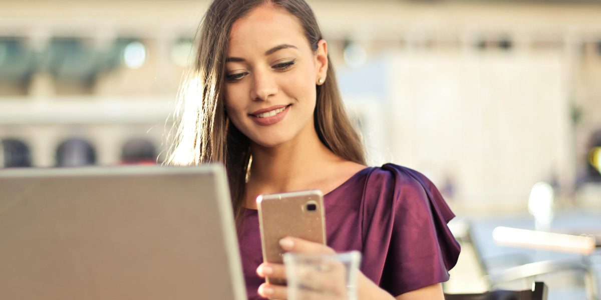 A person enjoys seamless connectivity, working or streaming effortlessly in a relaxed setting.