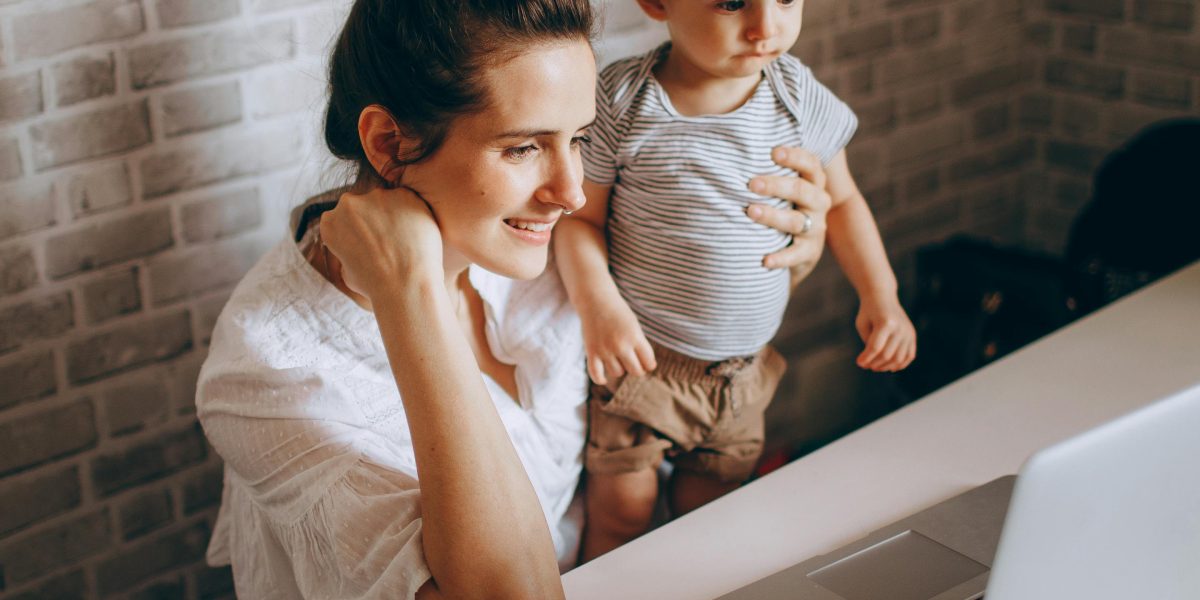 A parent engaging with a child about screen time limits, illustrating the human challenge of parental controls.