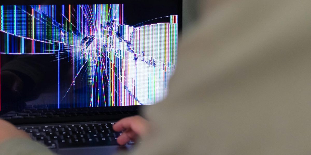 A person actively inspecting a networking device, trying to diagnose a Wi-Fi problem at home.